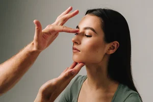 Woman receiving EFT Tapping